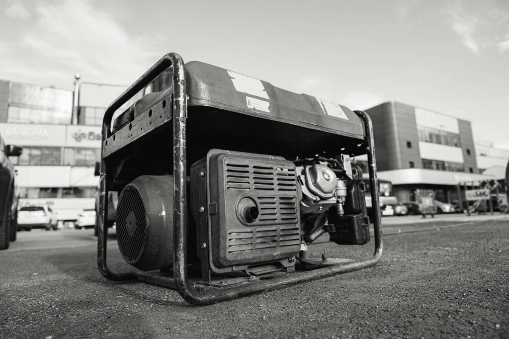 black and white image of a small generator for household or small business use